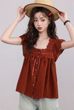 เสื้อเบลาส์สีสนิมตกแต่งลูกไม้และกระดุม