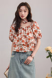 เสื้อแขนพองลายดอกไม้สองชั้น