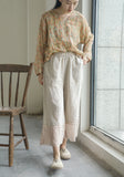 เสื้อกี่เพ้าคลื่นอันแสนงดงาม