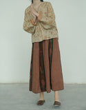 เสื้อกี่เพ้าคลื่นอันแสนงดงาม