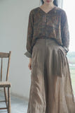 เสื้อกี่เพ้าคลื่นอันแสนงดงาม