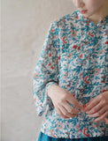 เสื้อกี่เพ้ารุ่งอรุณอันนุ่มนวล